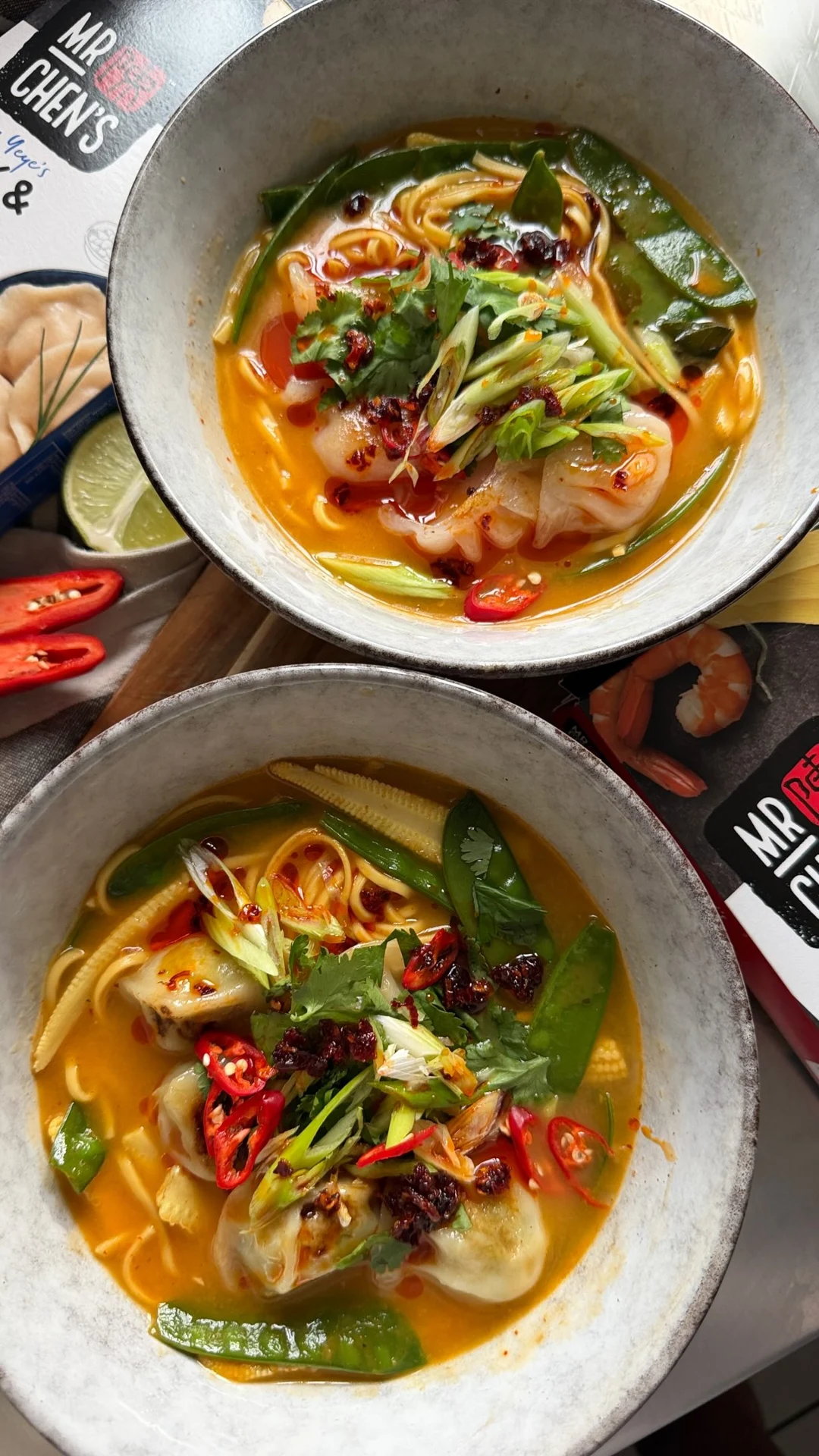 Two bowls of red curry dumpling ramen with Mr Chen’s products